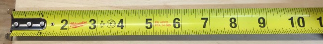 The Milwaukee General Contractor tape measure has a 1 1/16" wide blade with a 9' standout