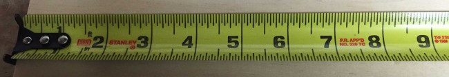 The Stanley FatMax tape measure has a 1 1/4" wide blade with an 11' standout