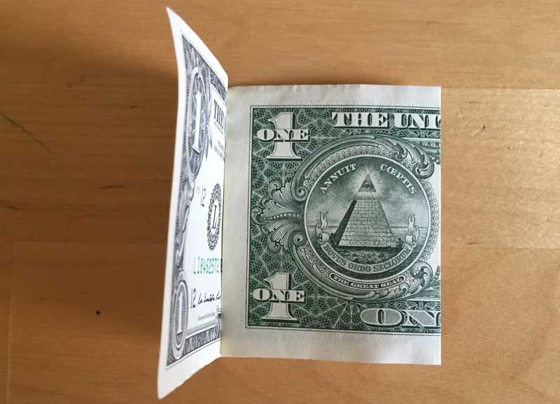 Ensure the second fold is even then crease the fold