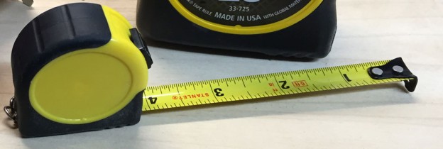 tape measure extended showing the markings on the tape
