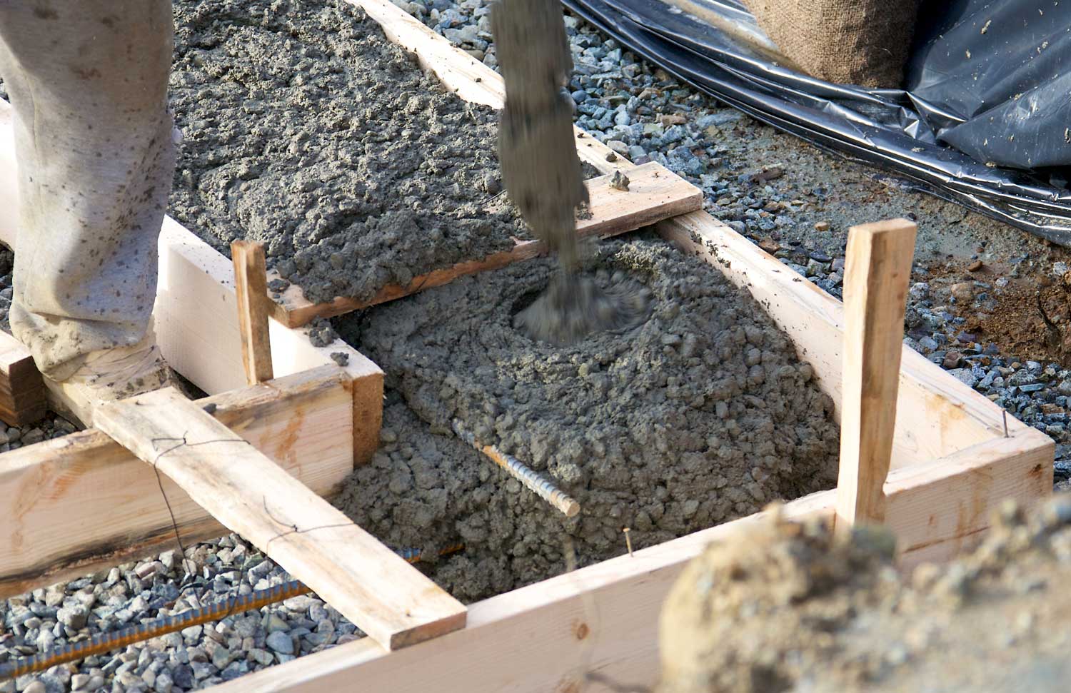 New concrete footings being poured