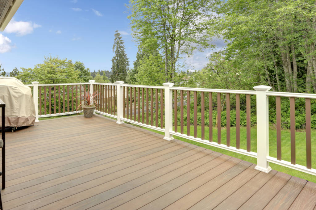 Newly installed deck with composite decking, hidden fasteners, and screws