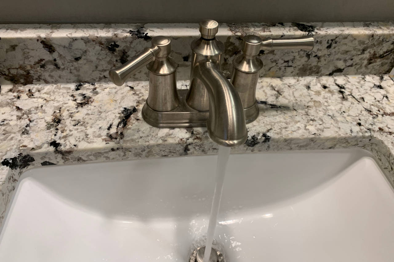 faucet with the hot water running