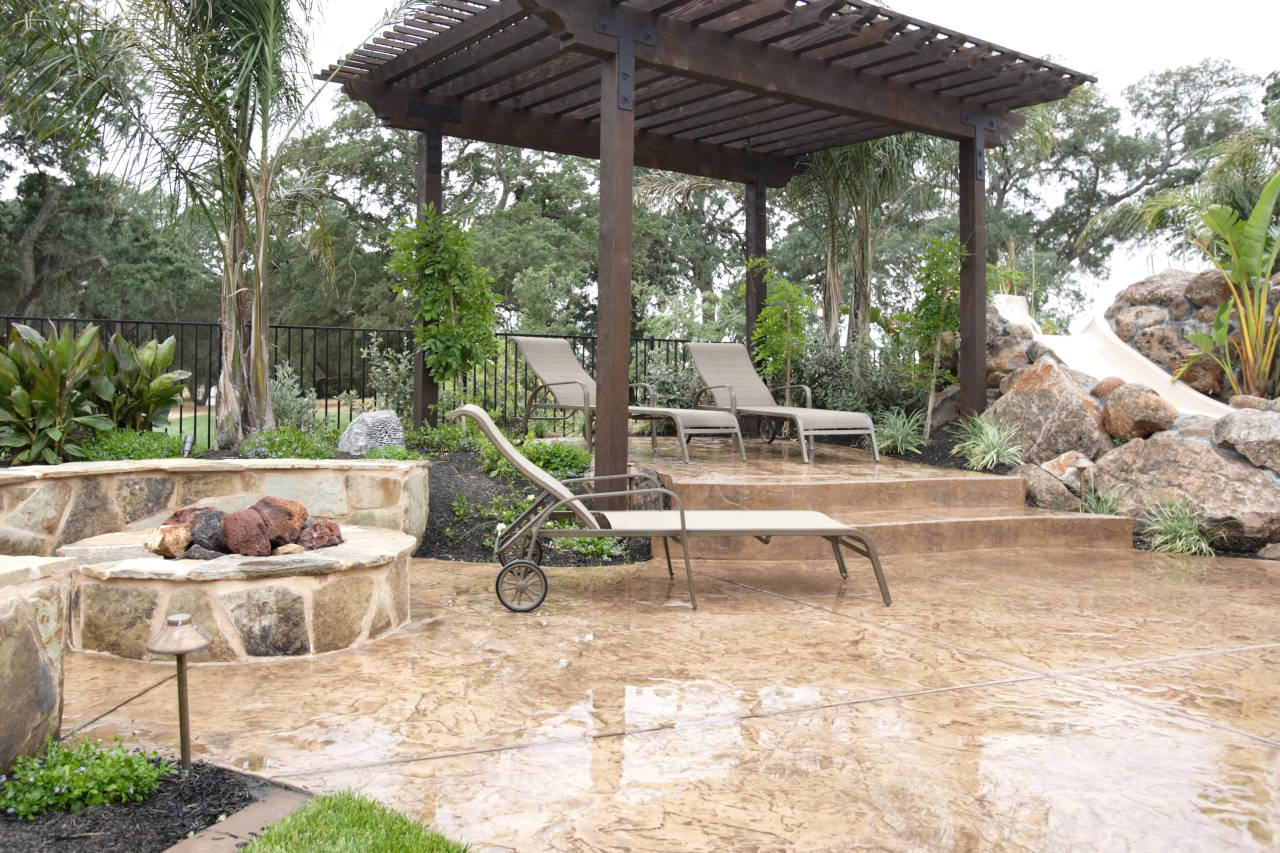 Concrete patio with tan color and stamped pattern