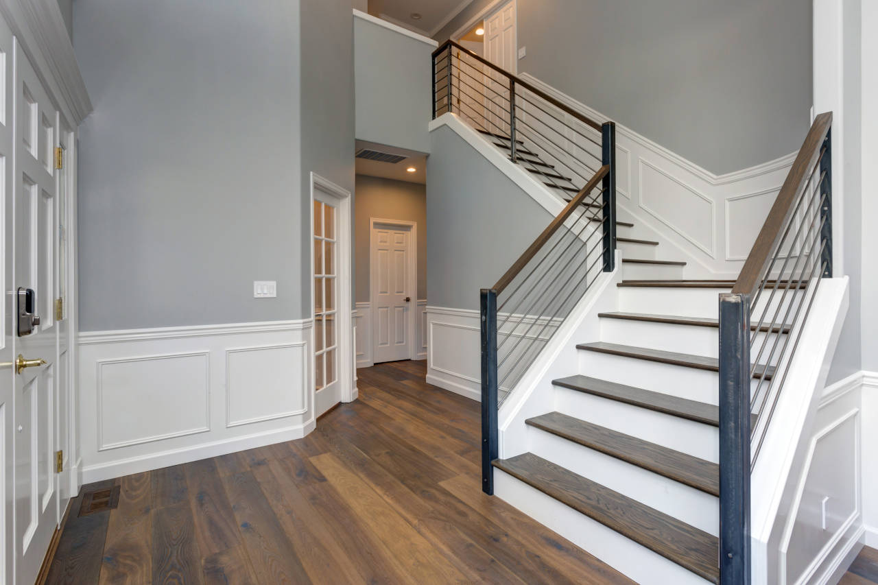 wainscoting installed on a set of stairs