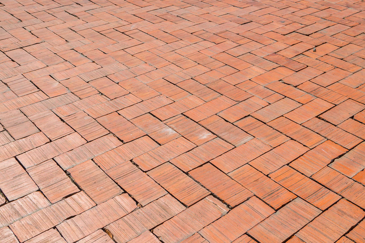 A brick patio is extremely beautiful and can be constructed from historic reclaimed brick or modern concrete bricks.