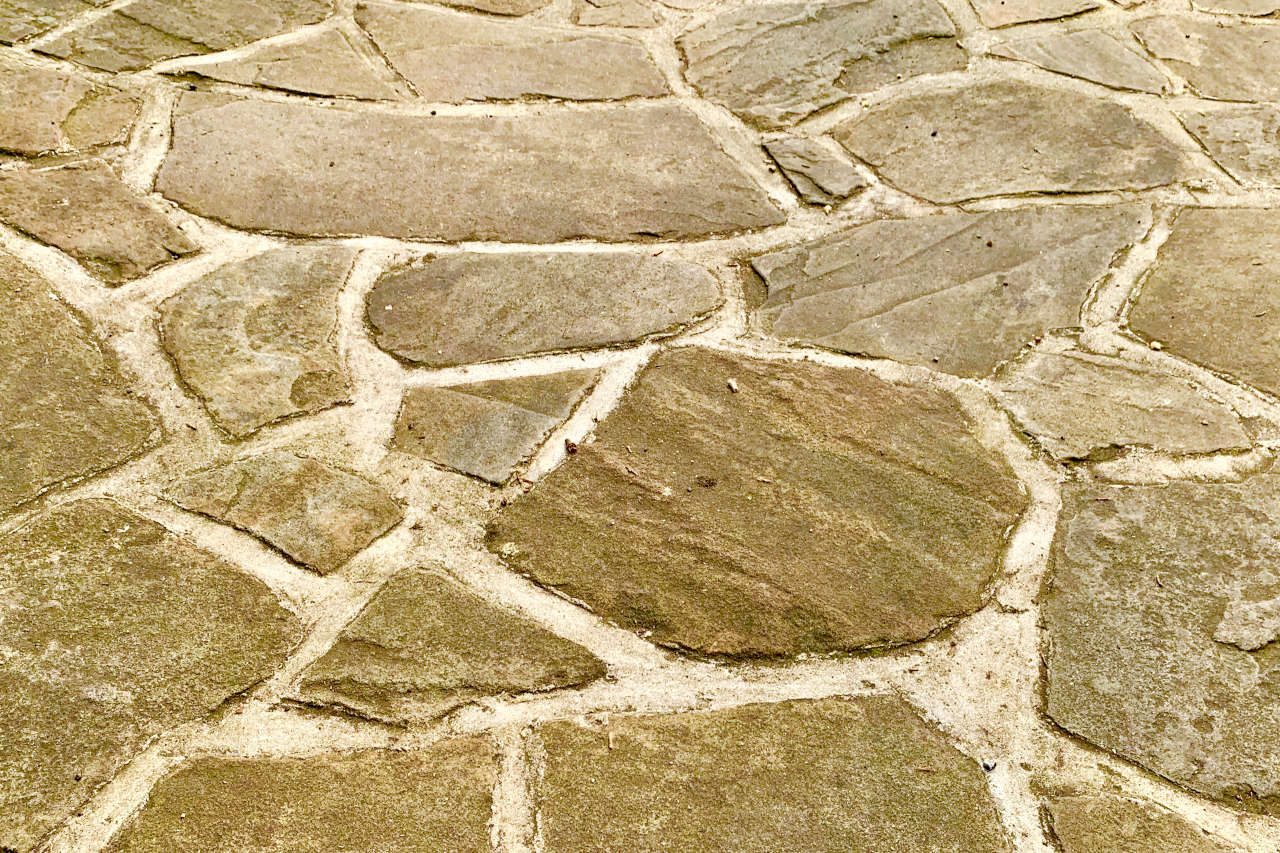 Flagstones are a great patio material, but are often the most expensive choice as they are the most difficult to install