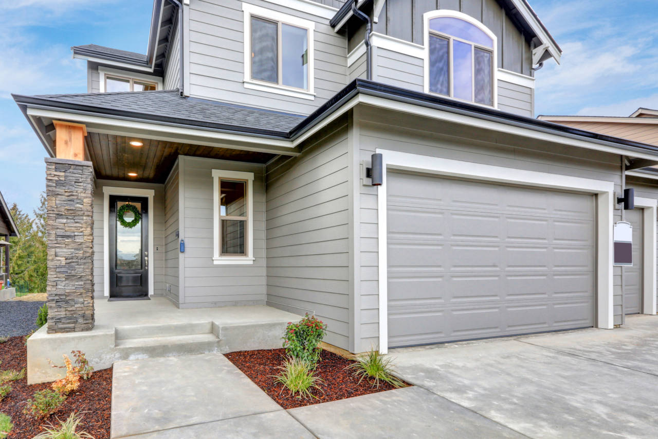 Newly installed clapboard fiber cement siding