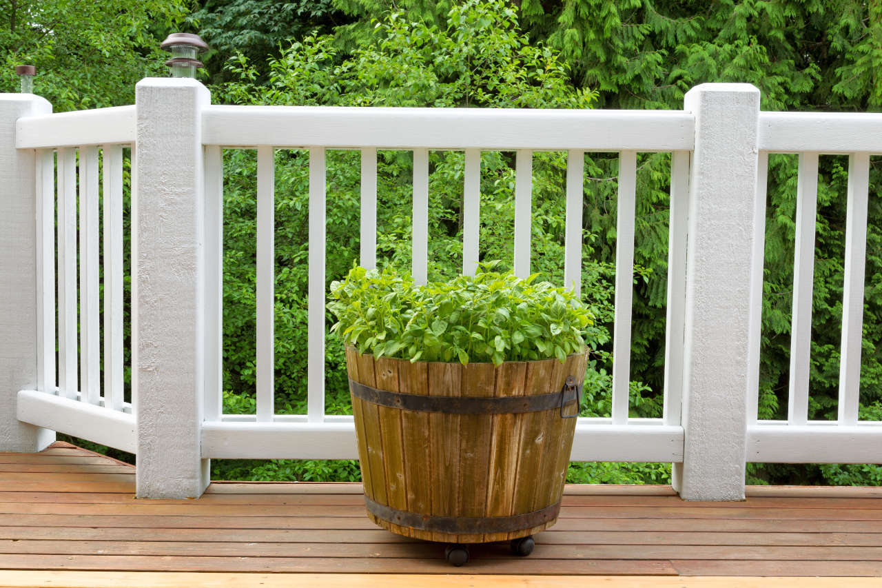 Deck railing with evenly spaced balusters