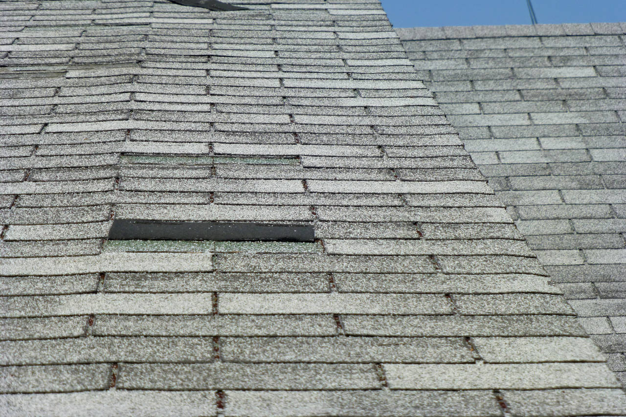 asphalt shingles showing signs of wear